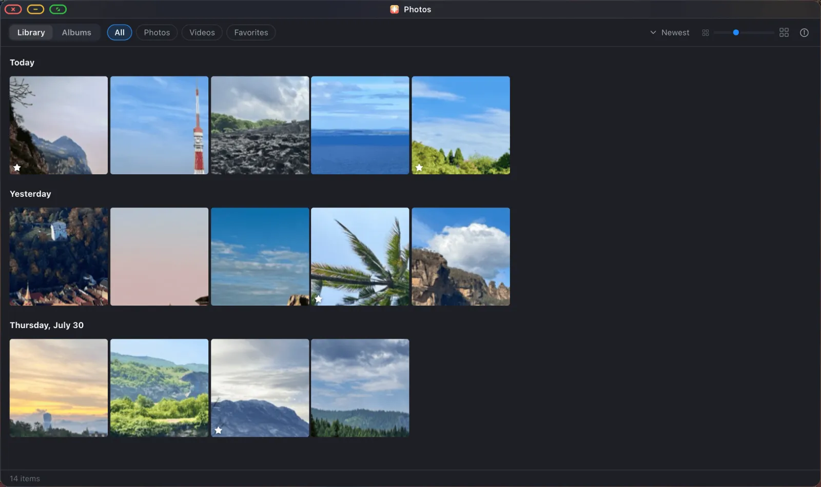 A photo library shown as a grid grouped by day, with Library and Albums tabs.